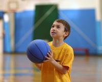 Boy Playing Basketball